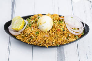 Egg Biryani [full] + Green Chutney + Buttermilk.