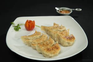 Veg Kothay ( Pan Fried Dumplings )