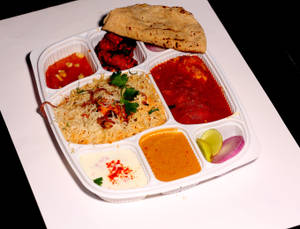 Chicken Biryani,Dum Ka Chicken,2 Pulkha,Chilli Chicken, Raita, Salan With Qubani Ka Meetha