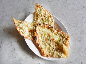 Cheese Naan ( 1 Pc ) 