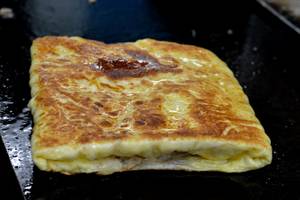 Egg Veechu Parotta