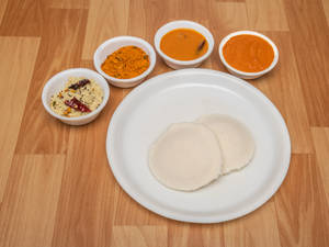 Idli (2pc) (Served with Chutney, sambar)