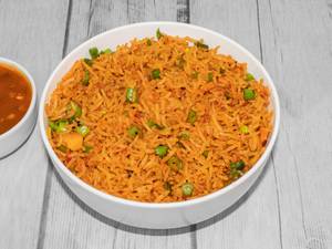 Veg Schezwan  Rice (650 ML) (Served with Raita, Onion and Gravy)