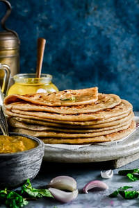 Healthy Aaloo Paratha Served With 1 Amul Butter