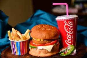 Veg Cheese Burger With Fries And  Cold Drinks