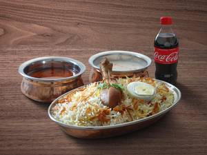 Hyderabadi Chicken Dum Biryani + Coke 250 Ml Pet                        