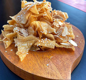 Honey Caramelized Darsan With Roasted Almond Flakes