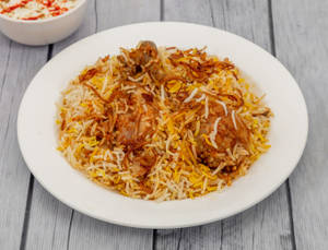 Chicken Biryani (Small) (Served With Raita & Salad).
