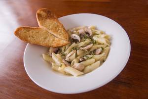 Veg Wild Mushroom Penne Pasta In White Sauce