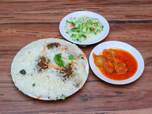 Beef Biryani Full [ served with raita & Pickle]