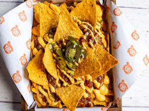 Cheesy Nacho With Salsa And Jalapeno