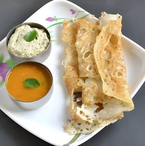 Rava Onion Dosa (Served with White Chutney, laal Chutney and Sambhar)