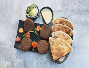 Veg Shami Kabab Ulta Tawa Combo ( 1 Plate Shamikabab (4 Pcs) + 2 Ulta Tawa Shahi Paratha)