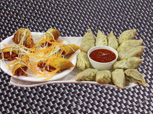 Veggie Darjeeling Momos 12 Pcs + 6 Pcs Spring Roll Served With Red Sauce & Green Chutney  & Meyonies