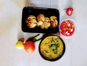 Dal Bati And Gulabi Choorma 