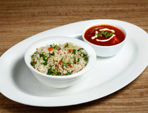 Veg pulav + paneer butter masala