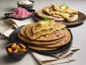 Paneer Paratha With Raita, Pickle & Papad