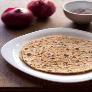 Stuffed Pyaz  Paratha With Salad Chutney & Butter 