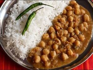 Chole + Chawal / 3 Rotis + Achaar + Papad + Salad