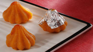 Orange Badam Modak