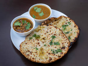 Amritsari Kulcha ((2 Pcs)) Chana + Dal
