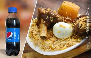 Special Mutton Biryani + Pepsi 200 ml( served along with pepsi)