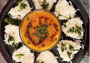 Steamed Rice And Dal Tadka