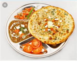 2 Amritsari Butter Kulcha + Dal Makhani + Pepsi 300ml
