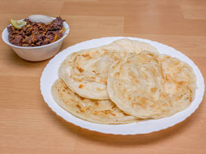 Parotta With Erachi Roast