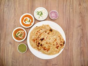 Butter Tandoori  Roti (4 Pcs)Thali(Dal Makhani + Shahi Paneer + Raita + Salad)