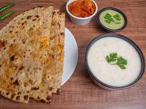 Paneer Paratha With Curd