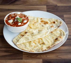 Butter Chicken + 2 Butter Naan