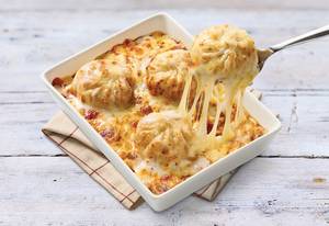 Cheesy Baked Veg Momos [6 Pcs]