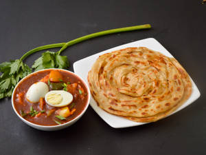 Parotta (2) With Chilly Egg (Semi Gravy 250 Ml)