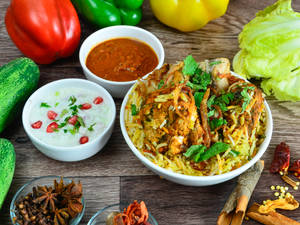 Egg Chicken Biryani With Salad 