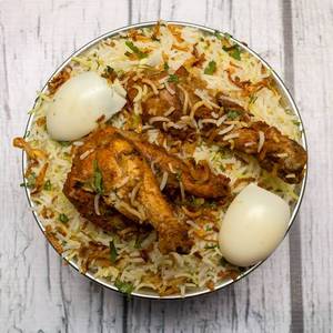 Egg Potato & Chicken Dum Biryani(Served with raita)