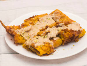 Double Egg Malpuva With Double Rabdi    