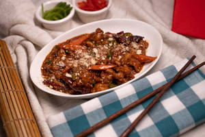 Wok Tossed Chicken With Dry Chilli And Peanuts.