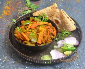 Sabji (Seasonal) + 4 Butter Roti