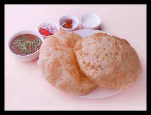 Chola Bhatura (2 Pcs) + Salad + Raita