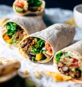 Tex Mex Burritos Al Olio [tomato Salsa,rice,veg/ch/lamb,jalapeno,corn,bellpepper,wrappd In Tortilla]