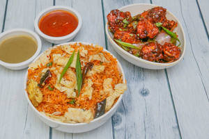 Egg  Schezwan  Rice With Chilli Chicken