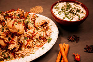 Murgh Yakhni Pulav Combo For 1(pulav+2pieces Chk. Chutney Kebab+fhirni+kachoombar)