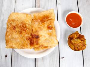 Egg mughlai paratha with aloo ki sabzi and onion salad