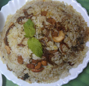Malabar Chicken Biriyani With Soft Drink And Sweets