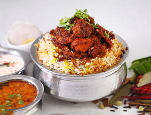 Chicken Fry Piece Biryani(serves withraita and salan )