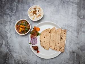  Roti (4 Pcs) + Paneer Masala + Salad + Curd