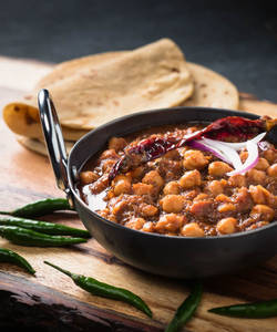 Chole Masala Sabji + Aloo Gobi Mix Curry Sabji + Chapati (3 Pcs) + Steamed Rice + Dal + Curd + Salad