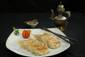 Chicken Kothay ( Pan Fried Dumplings )