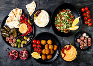 Hummus, Tzatziki, Falafel, Tabouleh Salad & Pita.